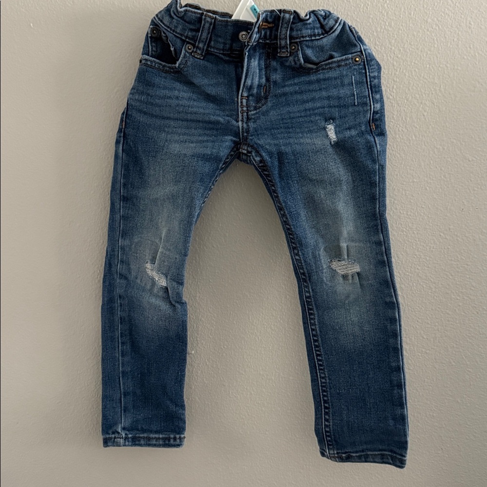 Distressed Blue Jeans for Kids. Slim size 4